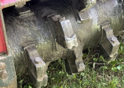 Close-up of the forestry mulcher cutting teeth