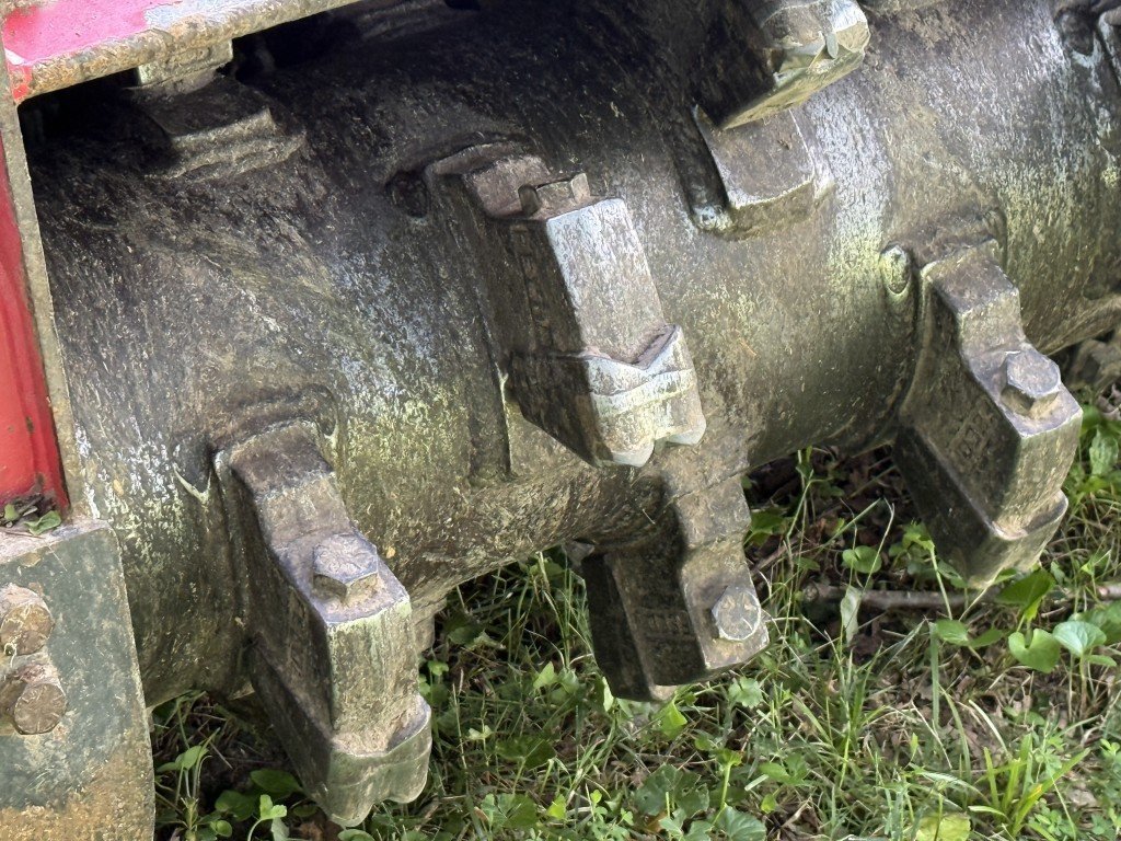 Close-up of the forestry mulcher cutting teeth